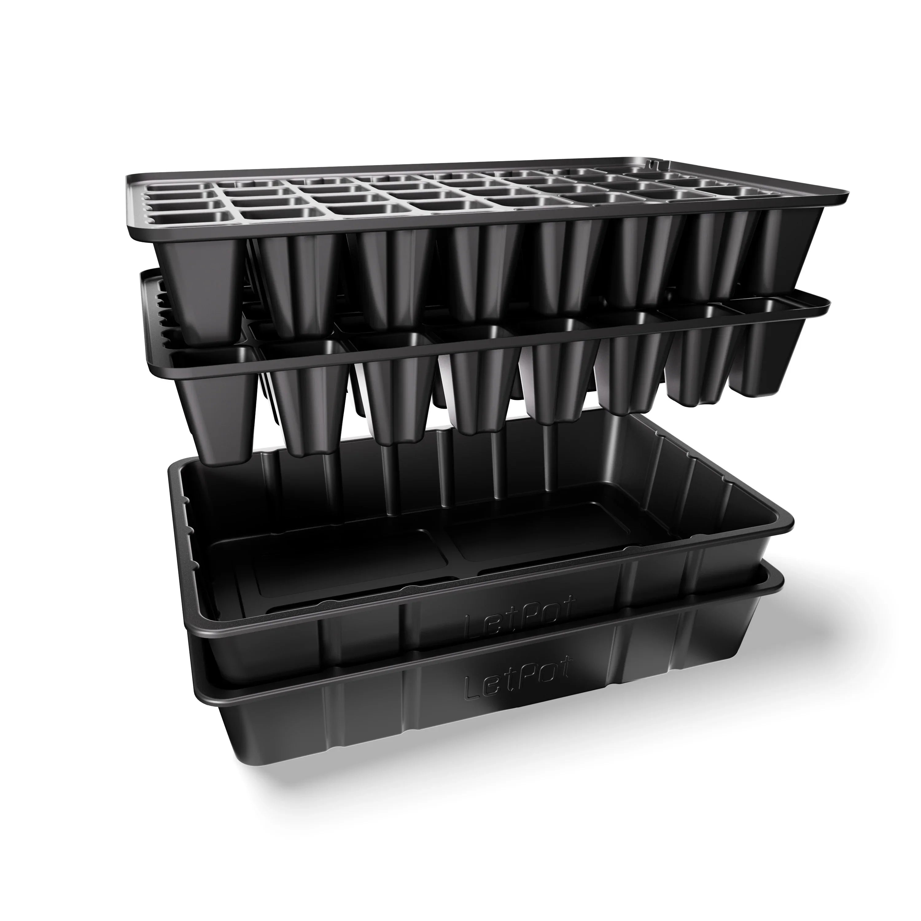 Stacked black plastic seed starter trays for indoor hydroponic gardening on white background