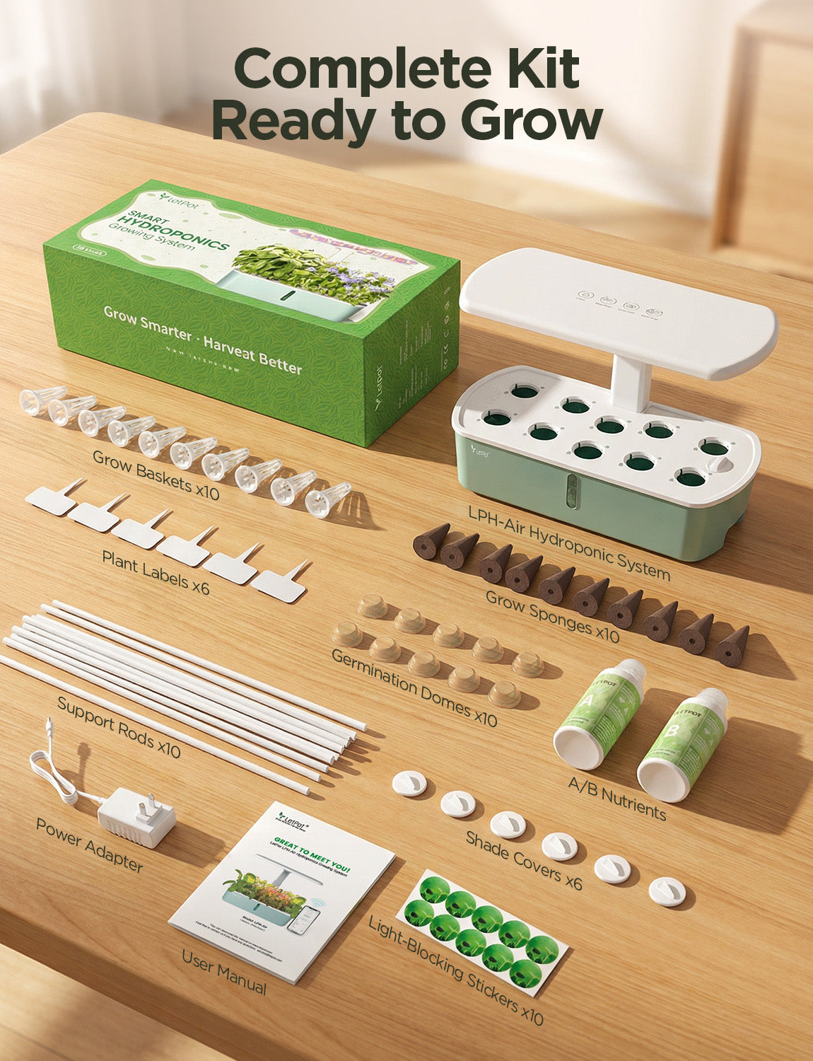 Indoor hydroponic system kit with accessories including plant baskets, sponges, nutrient bottles, support rods, plug adapter, manual, and stickers.